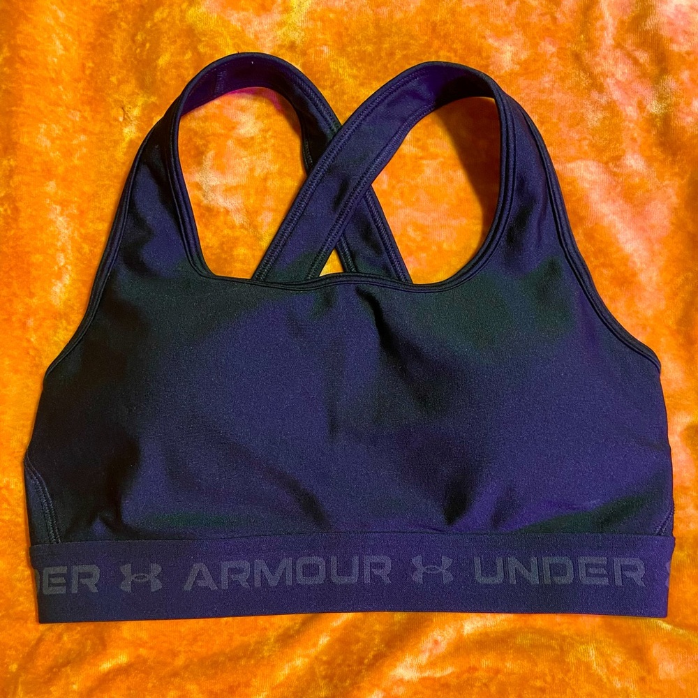 Brand new Black underarmour sports bra. Size M. Runs a little small. Never worn